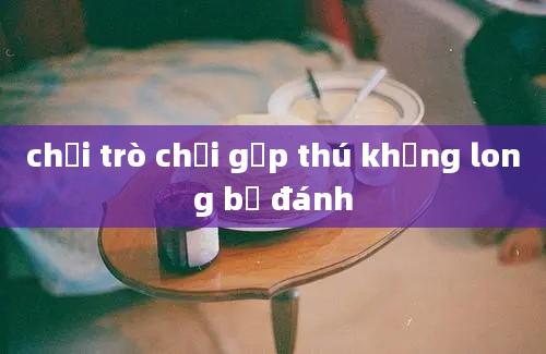 chơi trò chơi gắp thú khủng long bị đánh